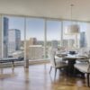 A luxury condo room overlooking a skyline