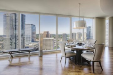 A luxury condo room overlooking a skyline